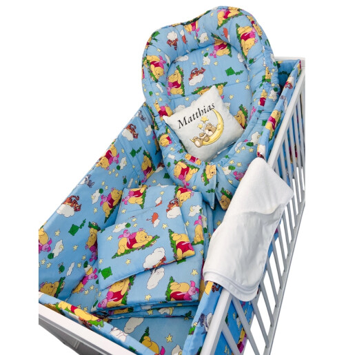Patut bebe + saltea + Lenjerie de pat CN Winnie pe albastru + cuib + prosop de baie + perna personalizata